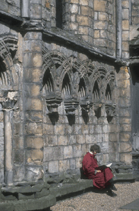 Rev. Dungoode sitting outside cathedral