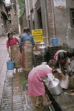 Womenfolk washing milk- or plutonium cans
