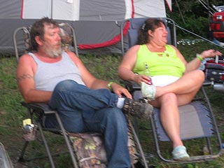 man & woman in outdoor chairs