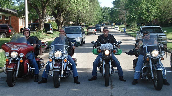 Four bikers departing